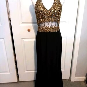 Lenovia beautiful black and gold gown size XL